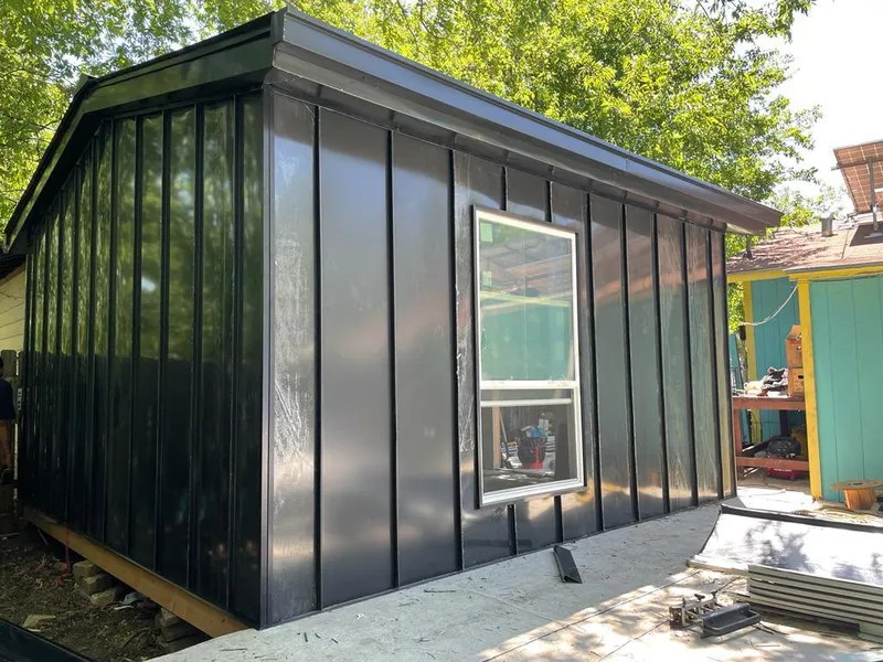 Black standing seam metal wall panels for Metal Roof Installation in Palmer