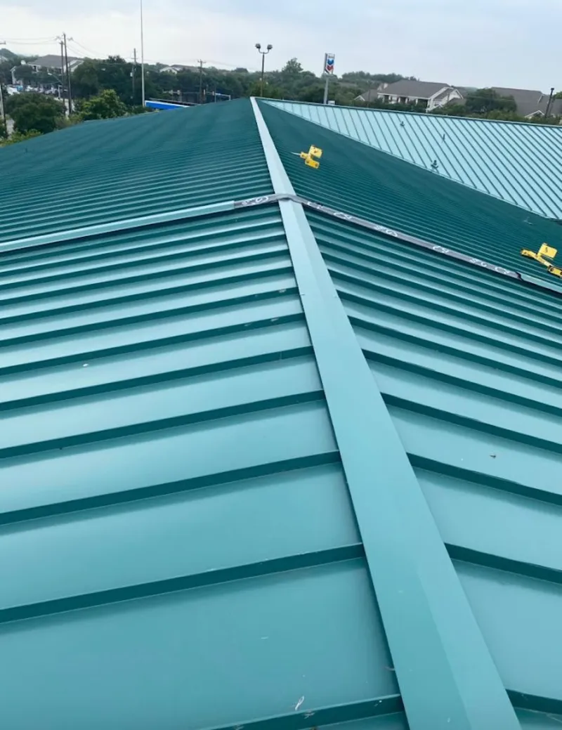 Green commercial metal roof ridge and valley for Metal Roof Repair in Palmer
